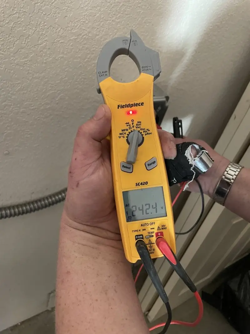 Voltage testing with clamp meter during Generator Installation in Hastings